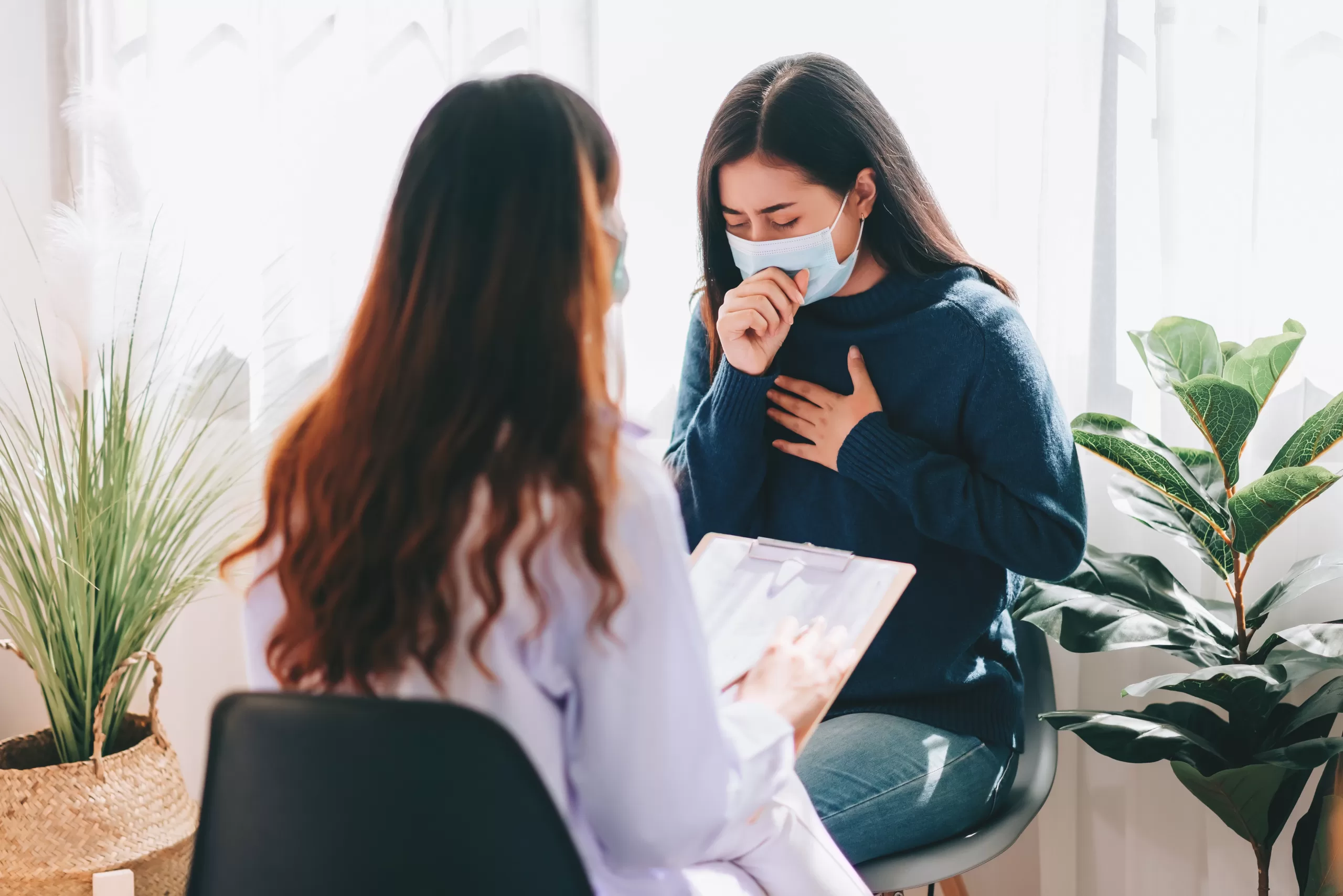 asian-doctor-visit-examines-young-adult-woman-hospital-with-cough-flu-symptomthe-doctor-checking-up- (1)