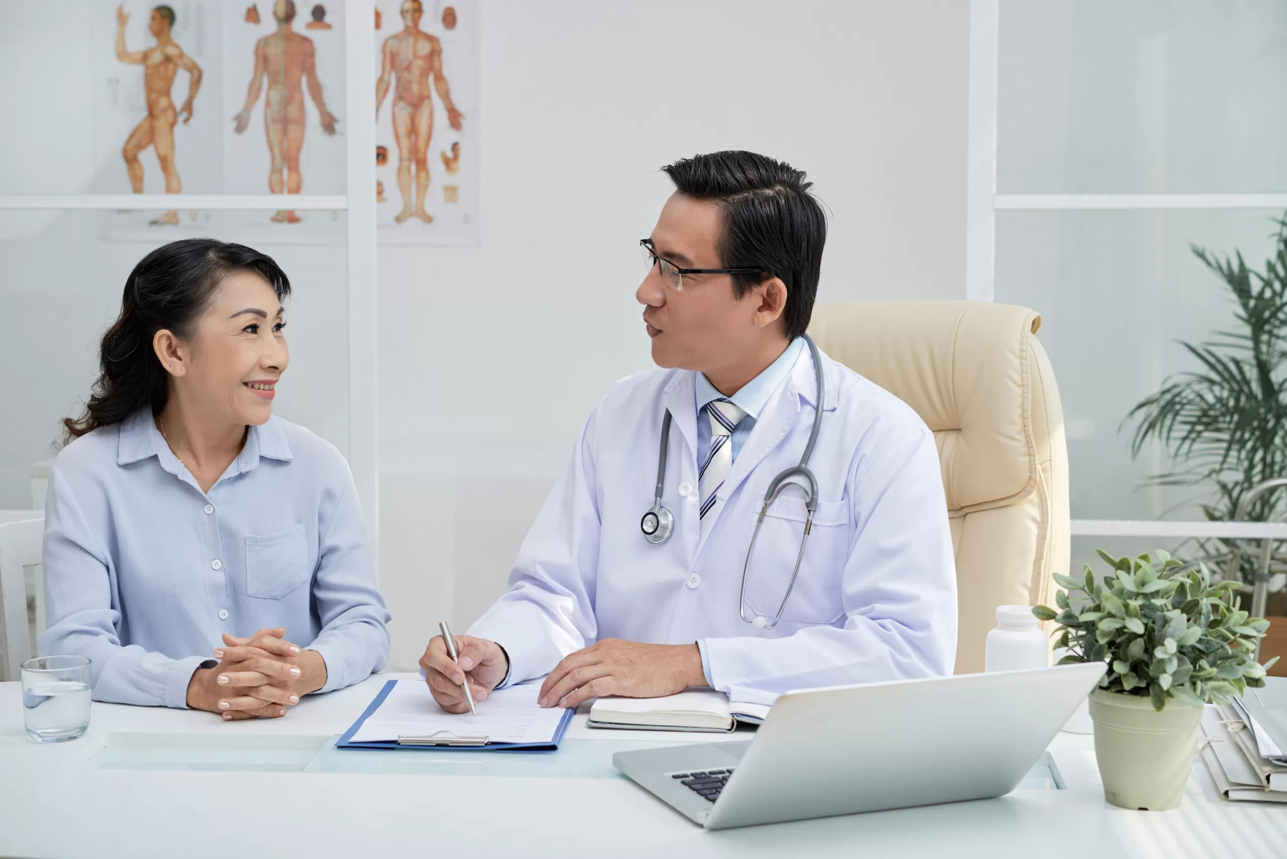handsome physician having appointment scaled